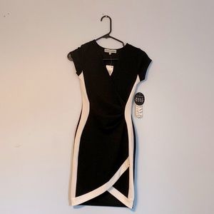 Black with white accent short length form fitting dress